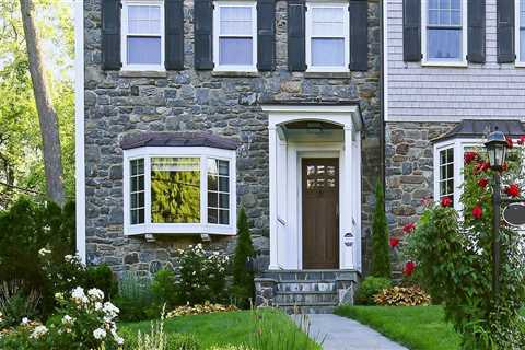 Curb Appeal Starts At The Top: How Roof Longevity Shapes Front Yard Landscaping In Kalamazoo